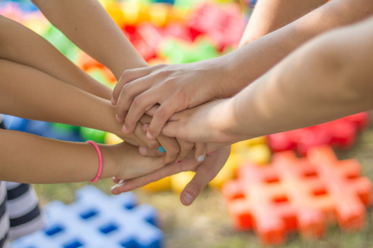 joined hands children community